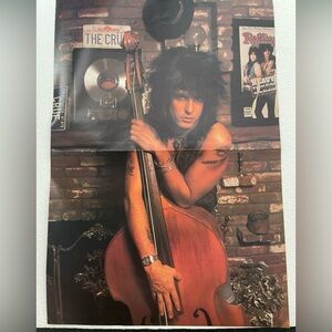 Vintage Music pinup of Motley Crue’s Nikki Sixx center